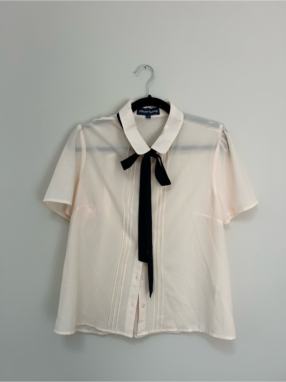 Princess Highway Cream Short Sleeve Blouse with Black Kitten Bow
